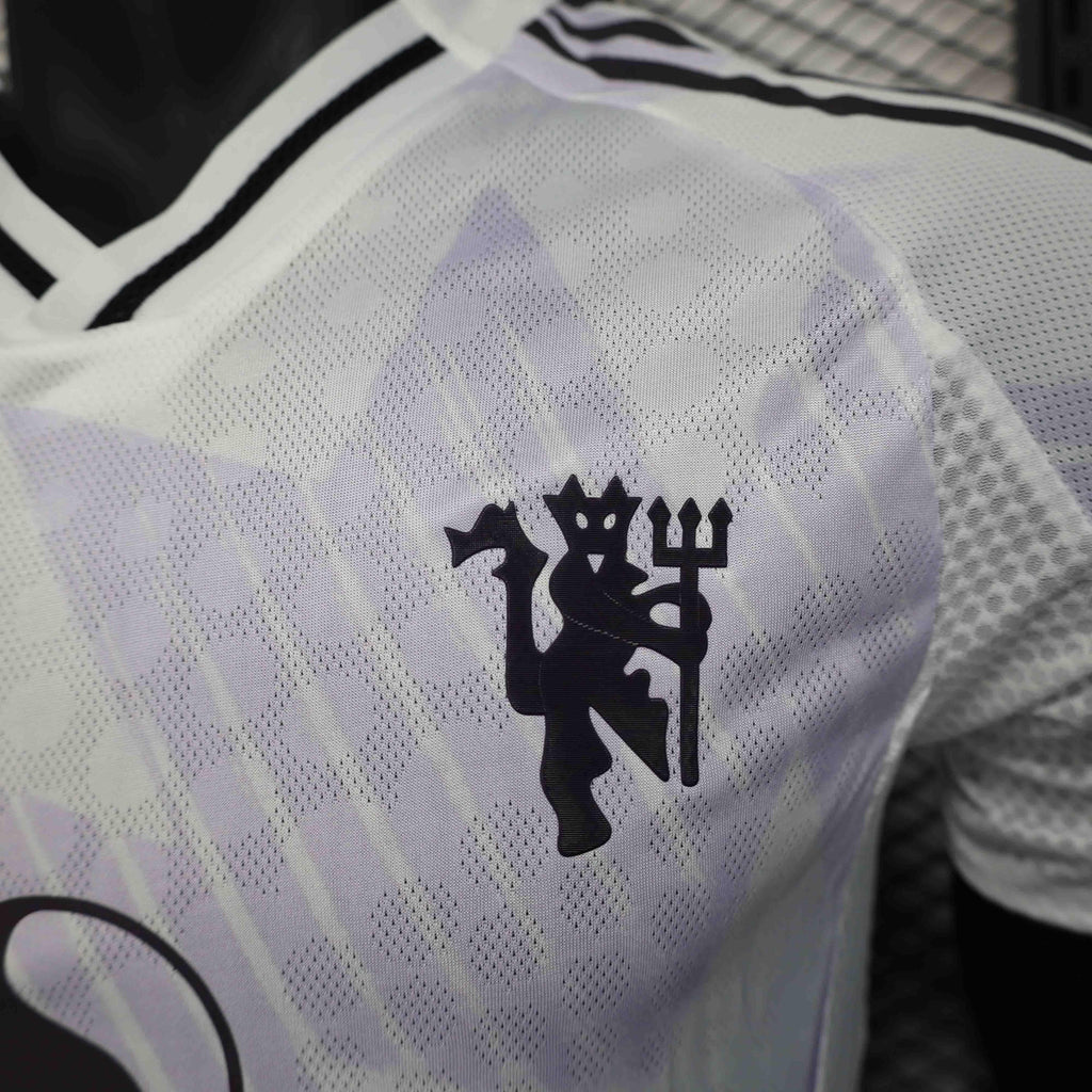 Camisola Manchester United fora 2025-26