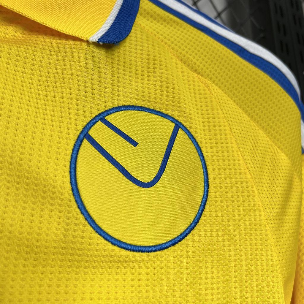 Camisola Leeds United fora 2024-25